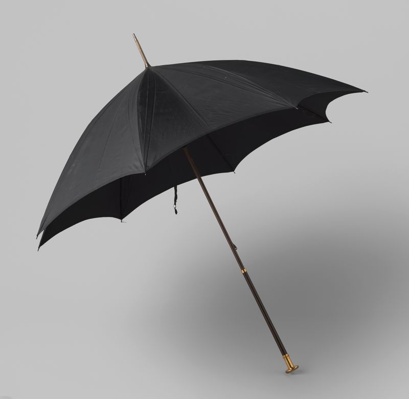 Arte decorativa com um guarda-chuva de seda preta de Brigg