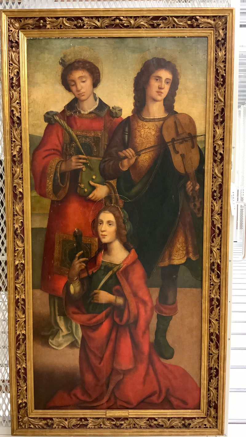 Tempera on panel depicting Saints Stephen, Genesio and Apollonia by Raffaellino del Garbo