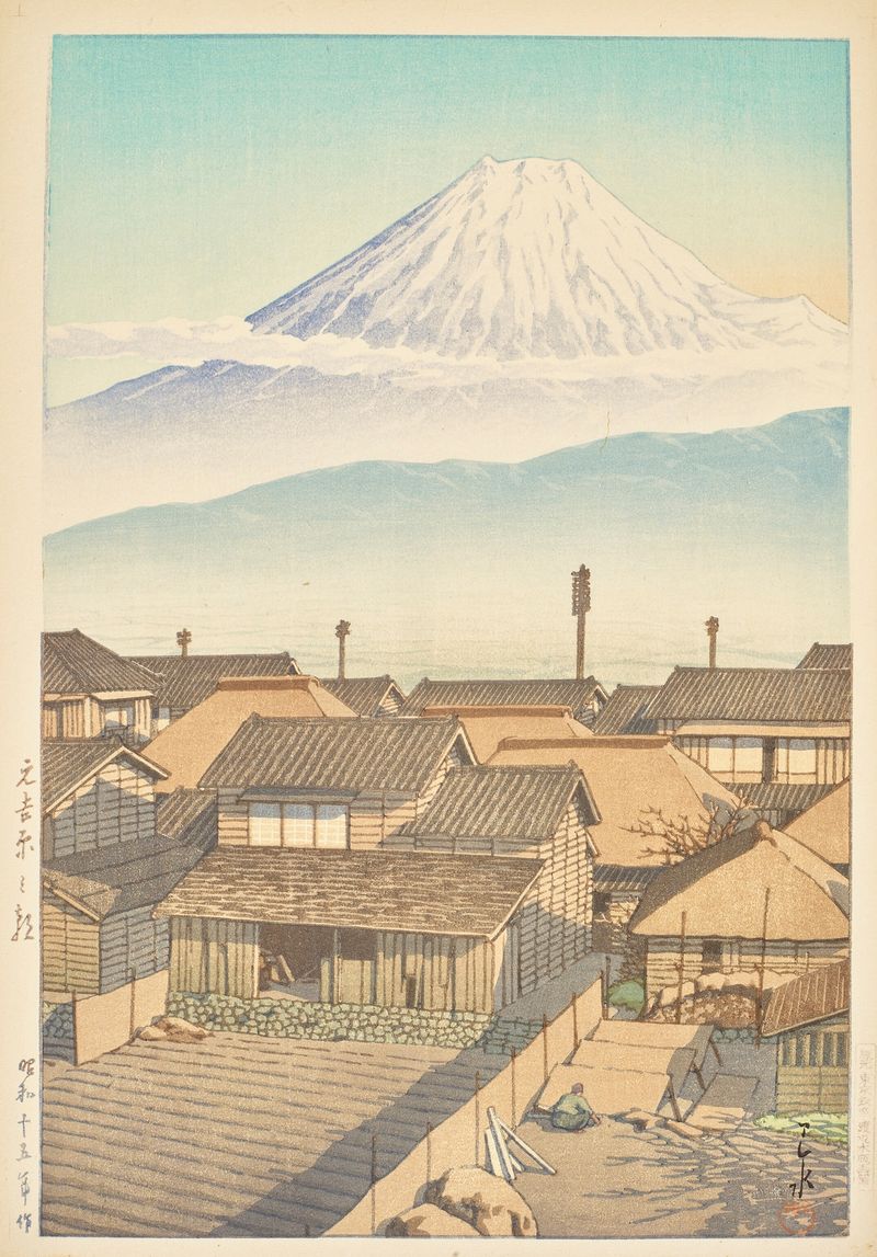 Grabado en madera de Kawase Hasui que muestra techos iluminados por la luz de la mañana.