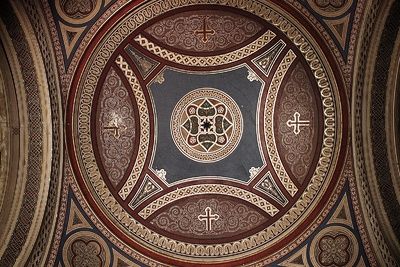 Fresco by Eva Bollert depicting a ceiling with soft blue and white hues