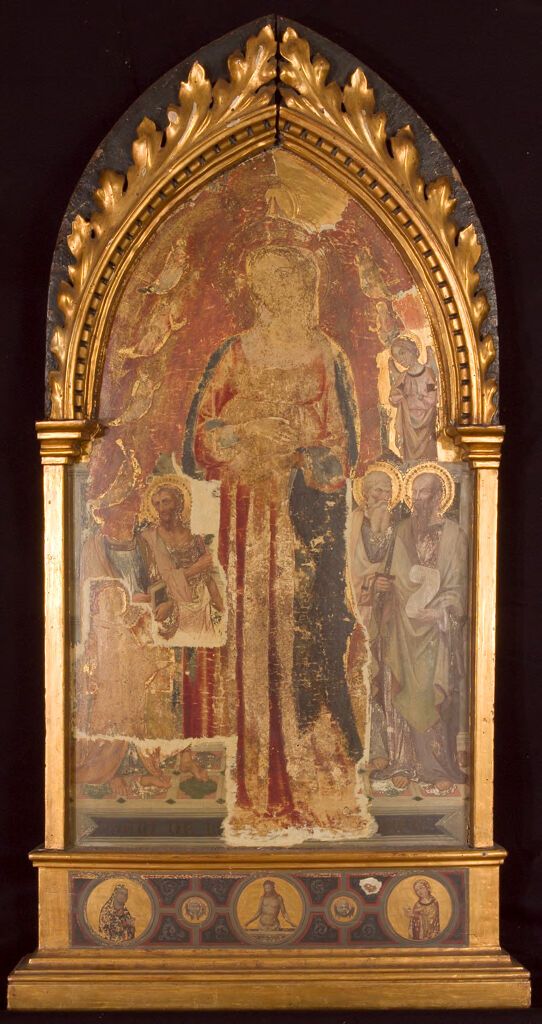 Obra de madera del siglo XIV de un artista no identificado que representa a una santa femenina mirando al cielo