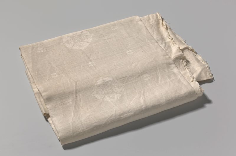 Decorative art featuring a hazelnut design on a linen tablecloth by Chris Lebeau