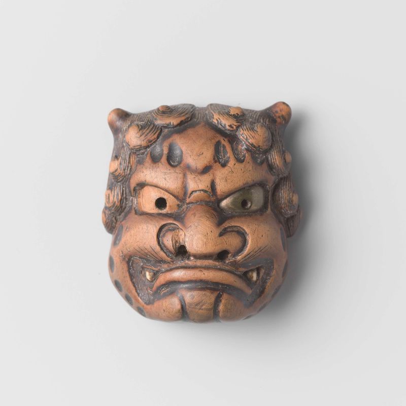 Netsuke talla de madera de Nagasada con personajes detallados