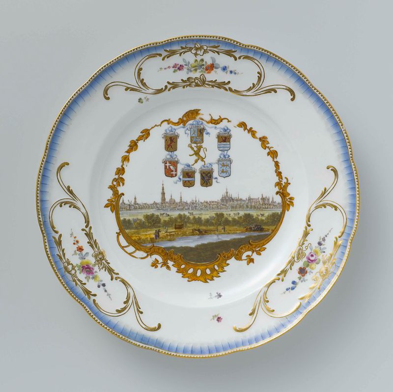 Seven ceramic plates depicting Dutch cities and landscapes by Meissener Porzellan Manufaktur