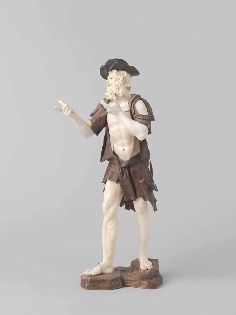 Escultura figurativa de un mendigo de Simon Troger, tallada en marfil.