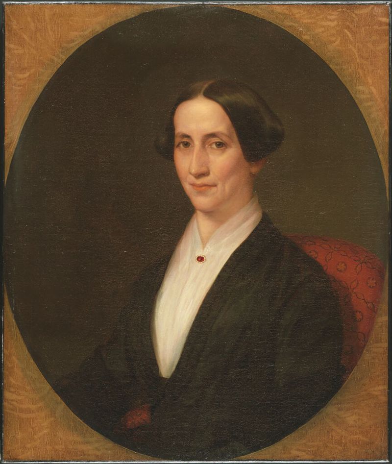 Portrait of a young woman in oil on canvas by Henry Peters Gray