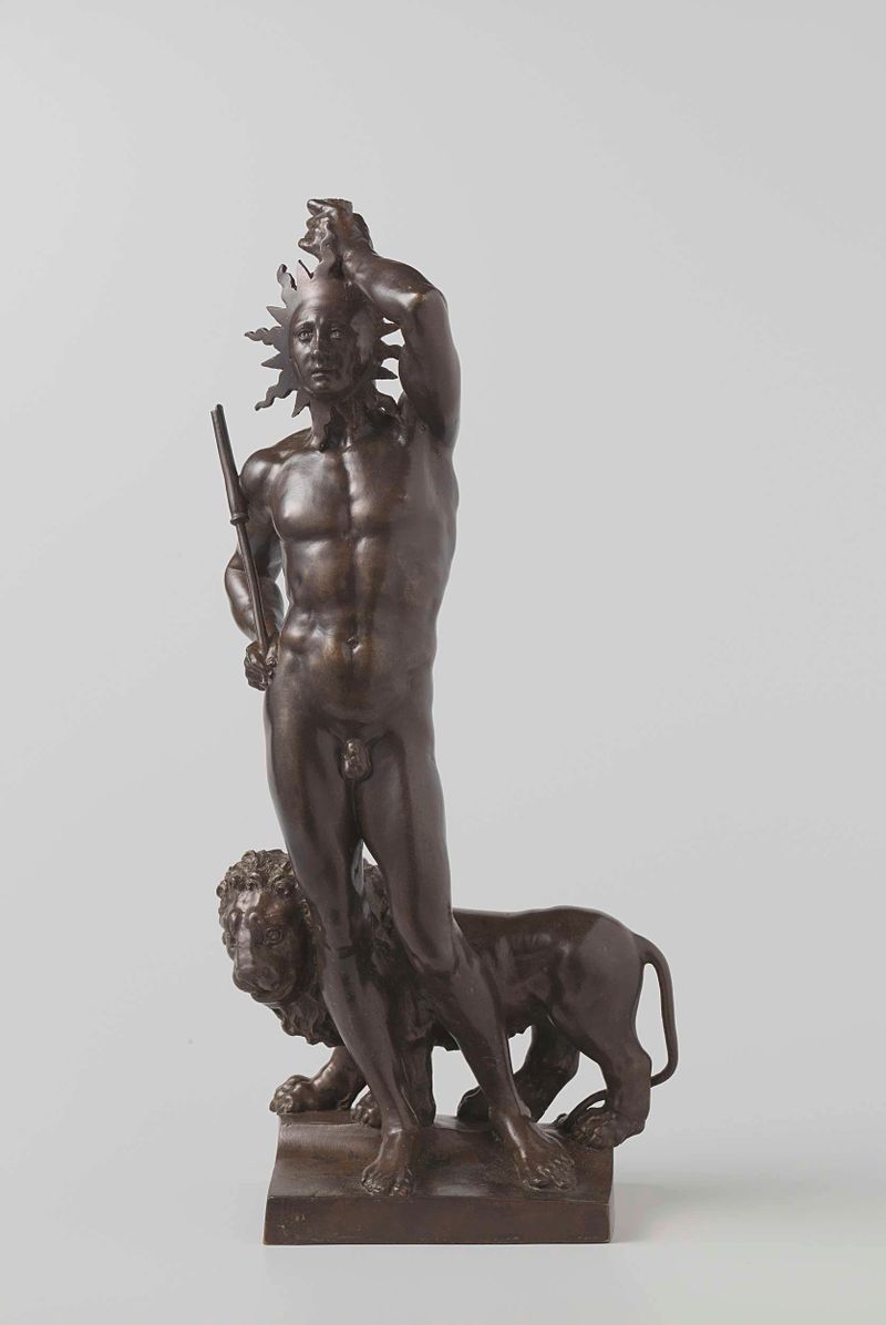 Statuette of Sol (the Sun) by Johan Gregor van der Schardt, depicting a young man with rays and a lion.