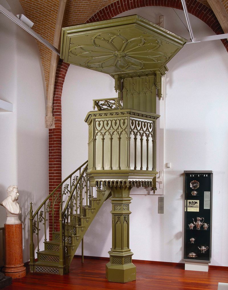 Pulpit with intricate ironwork by Enthoven & Co., Victorian style