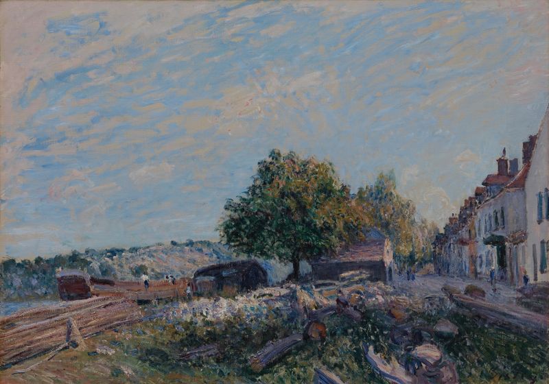 Saint Mammès-Morning de Alfred Sisley, óleo sobre tela, retrata uma serena paisagem fluvial ao amanhecer.