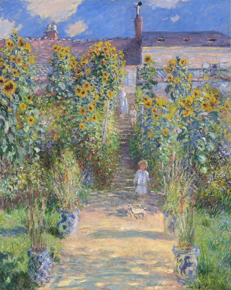 El Jardín del Artista en Vétheuil de Claude Monet, óleo sobre lienzo que muestra un vibrante jardín de verano.