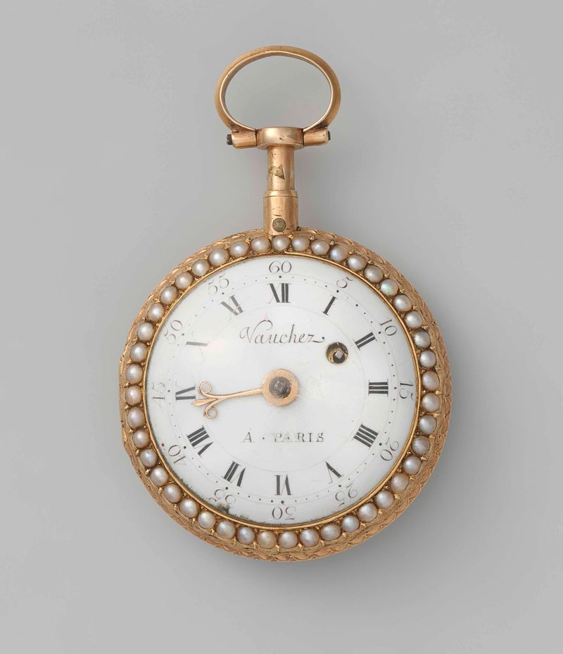 Repeating Watch de Firma Vaucher, metal, con grabados intrincados y diseño ornamentado.