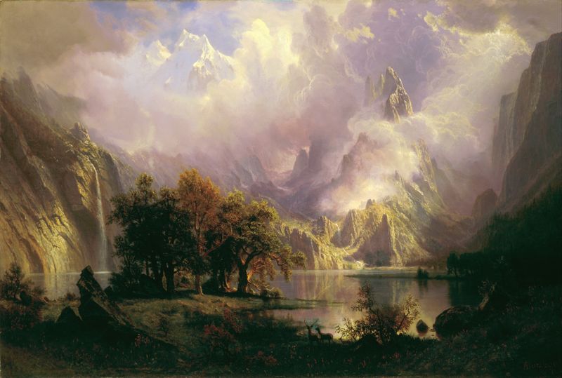 Rocky Mountain Landscape by Albert Bierstadt, oil painting depicting mountains and a luminous sky.