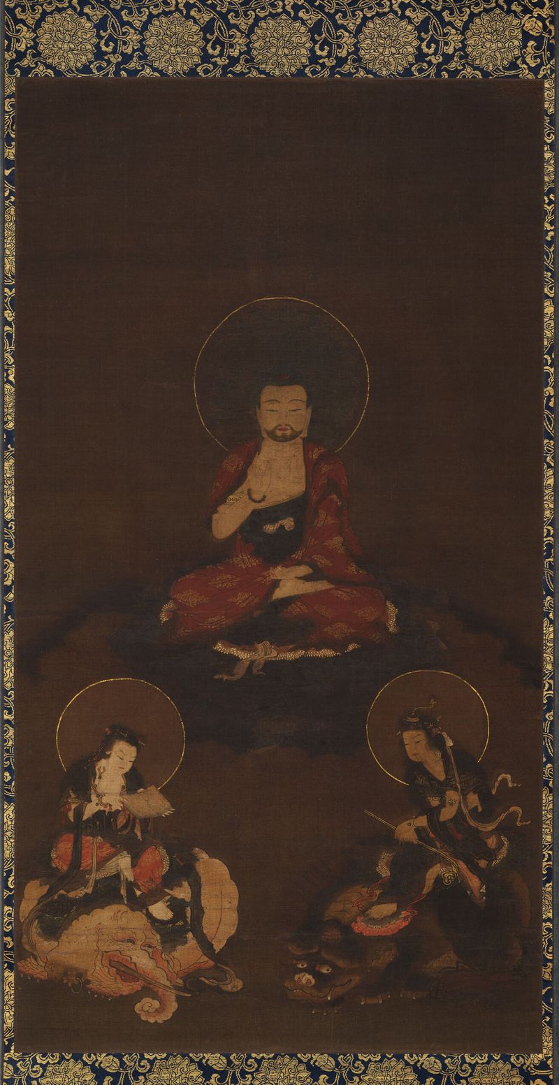 Escultura em ouro de Shaka Nyorai com Monju e Fugen de artista desconhecido