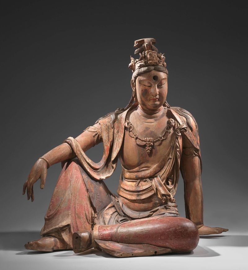 Escultura de madera de Guanyin meditando sobre una roca, artista desconocido